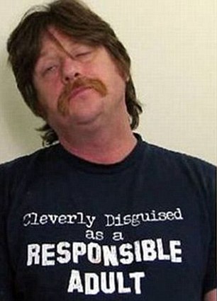 THE WORST T-SHIRTS TO BE ARRESTED IN HAVE BEEN REVEALED IN A HILARIOUS INTERNET GALLERY.